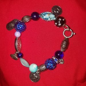 A blue beaded charm bracelet